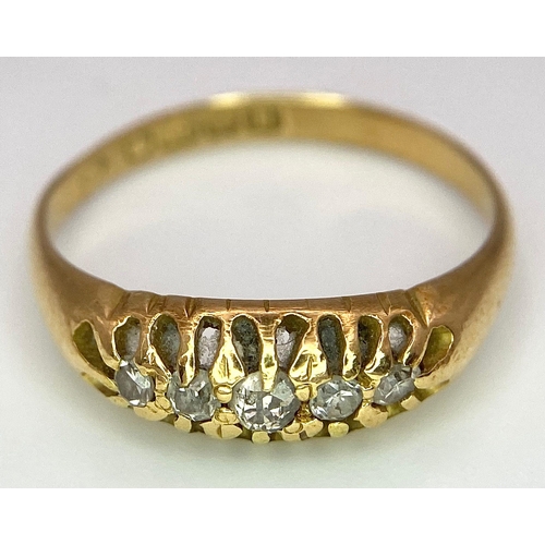 107 - An 18 K yellow gold ring with a band of five diamonds, size: O, weight: 3.2 g.