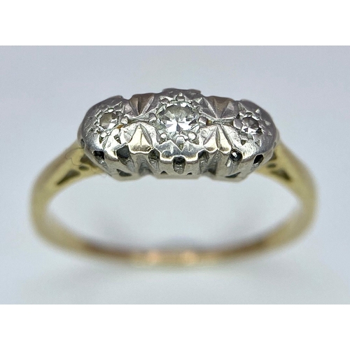 142 - An 18 K yellow gold ring with a trilogy of diamonds, size: K1/2, weight: 1.9 G.