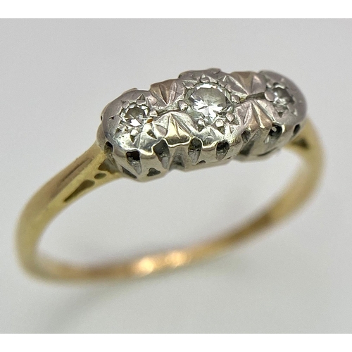 142 - An 18 K yellow gold ring with a trilogy of diamonds, size: K1/2, weight: 1.9 G.