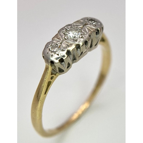 142 - An 18 K yellow gold ring with a trilogy of diamonds, size: K1/2, weight: 1.9 G.