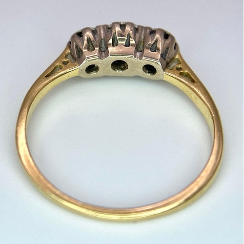 142 - An 18 K yellow gold ring with a trilogy of diamonds, size: K1/2, weight: 1.9 G.