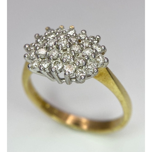 159 - An 18K Yellow Gold Diamond Cluster Ring. 0.50ctw. Size P. 4.1g total weight.