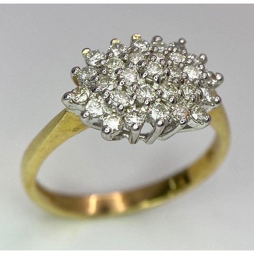 159 - An 18K Yellow Gold Diamond Cluster Ring. 0.50ctw. Size P. 4.1g total weight.