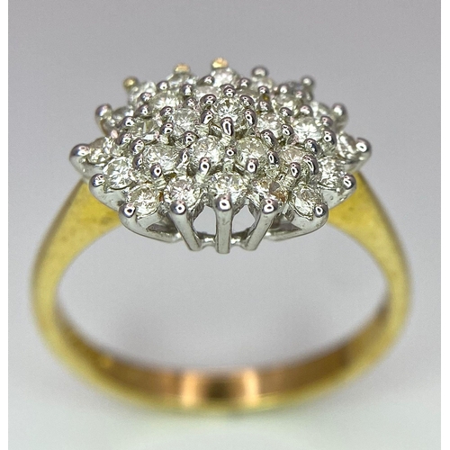 159 - An 18K Yellow Gold Diamond Cluster Ring. 0.50ctw. Size P. 4.1g total weight.