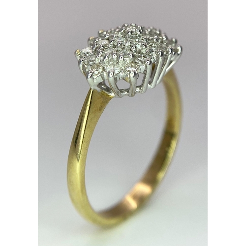 159 - An 18K Yellow Gold Diamond Cluster Ring. 0.50ctw. Size P. 4.1g total weight.