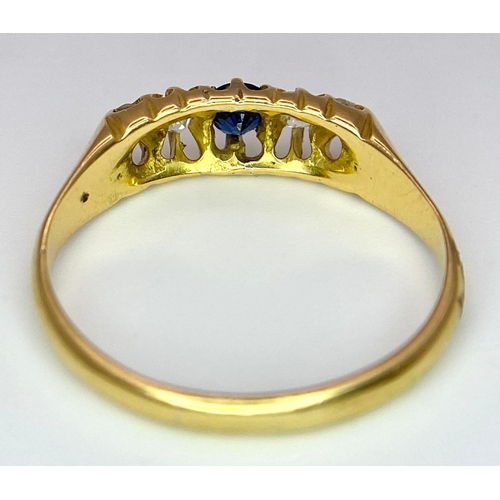 166 - A Vintage 18K Yellow Gold Diamond and Sapphire Ring. Size N. 2.8g total weight.