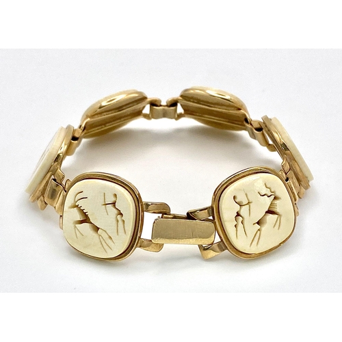 170 - A South African 9 K yellow gold bracelet and ring set with hunting scenes carved on bone. Ring size:... 