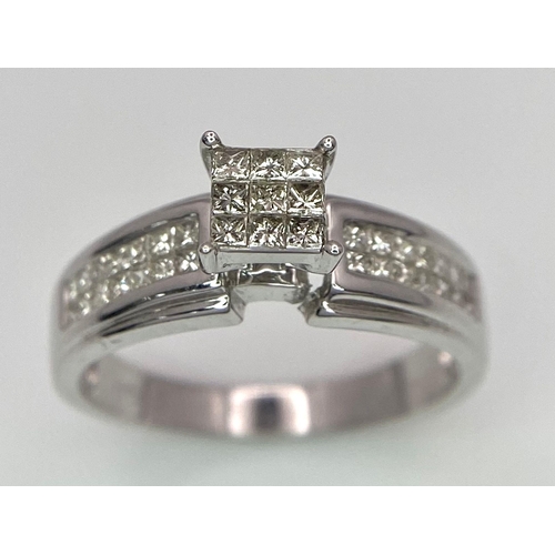 194 - A 14K White Gold Diamond Ring. Nine small central squares with diamond squares on shoulders. 0.50ctw... 