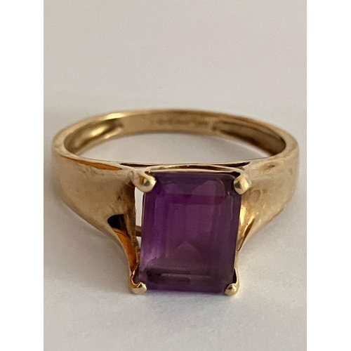 21 - 9 carat GOLD RING Having a large Emerald Cut (1.5 carat) AMETHYST SOLITAIRE set to top. Full hallmar... 