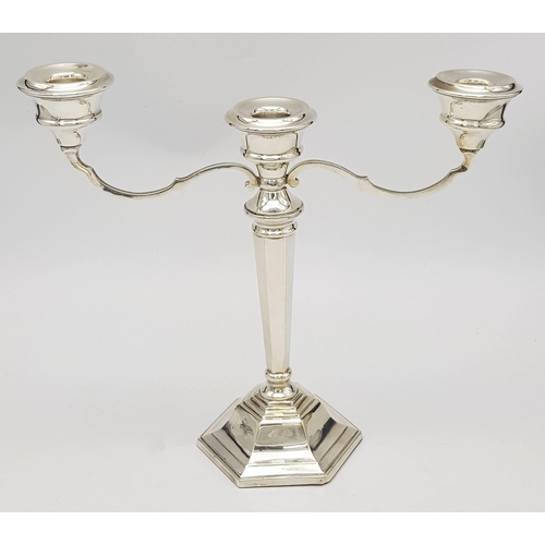 23 - A PAIR OF SILVER CANDELABRA EACH HOLDING 3 CANDLES IN CLASSIC STYLE AND HALLMARKED IN BIRMINGHAM 196... 