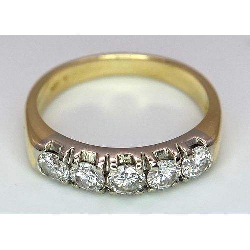 26 - An 18K Yellow Gold Five Stone Diamond Ring. 0.85ctw of brilliant round cut diamonds. Size L. 3.6g to... 