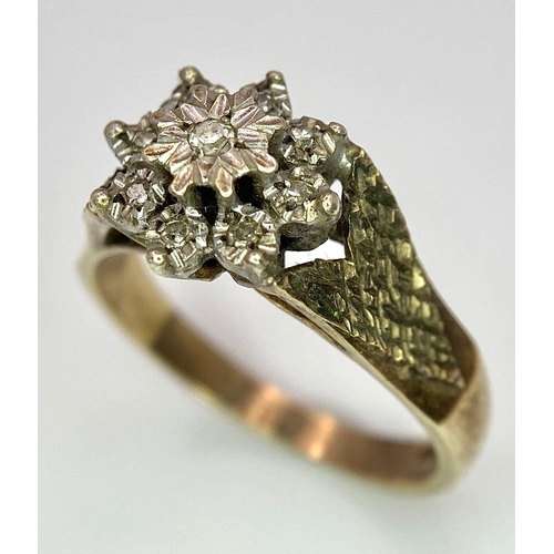 282 - A vintage, 9 K yellow gold ring with a cluster of diamonds. Size: N, weight: 3.4 g.