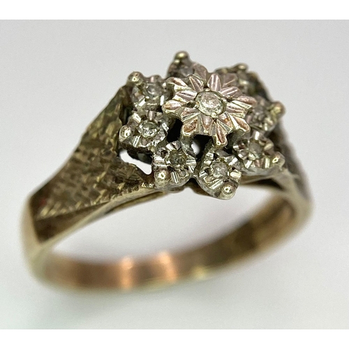 282 - A vintage, 9 K yellow gold ring with a cluster of diamonds. Size: N, weight: 3.4 g.