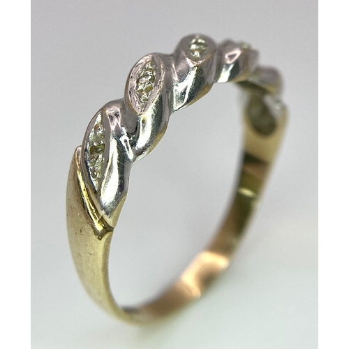 289 - A ( K yellow and white gold twisted ring with diamonds, size:  O, weight: 1.8 g.