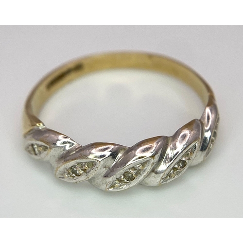 289 - A ( K yellow and white gold twisted ring with diamonds, size:  O, weight: 1.8 g.