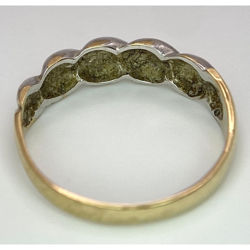 289 - A ( K yellow and white gold twisted ring with diamonds, size:  O, weight: 1.8 g.