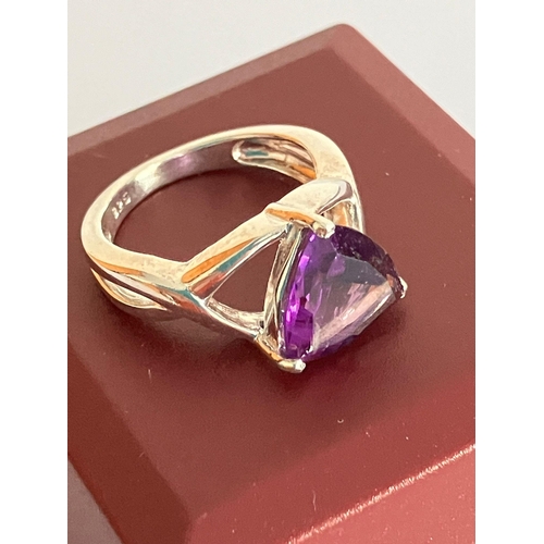 364 - SILVER and AMETHYST RING, Having a large ( 1.5 carat) triangular cut AMETHYST set to top in attracti... 