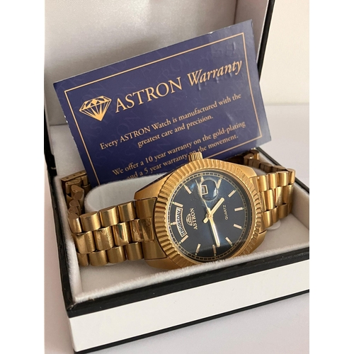 406 - Gentlemans ASTRON QUARTZ GOLD PLATED WRISTWATCH. Finished in Gold Tone with Bracelet strap. Day/Date... 