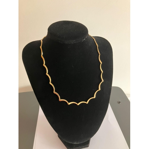 91 - Attractive and unusual 9 carat YELLOW GOLD NECKLACE with wavy design. Full UK hallmark. 11 grams. 45... 