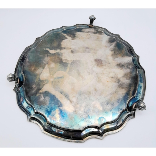 248 - A SOLID SILVER PLATTER DATED 1773 AND MADE IN SHEFFIELD .   518gms     25cms DIAMETER