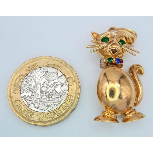 285 - A VERY CUTE 9K YELLOW GOLD ARTICULATED PUSSY CAT CHARM, WITH STONE SET EYES AND COLLAR, WEIGHT 6.1G ... 