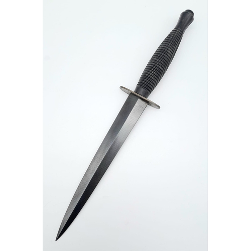 374 - A Fairbairn Sykes Design Commando Dagger by Wright and Son, Sheffield. 29cm Length in Leather Sheath... 