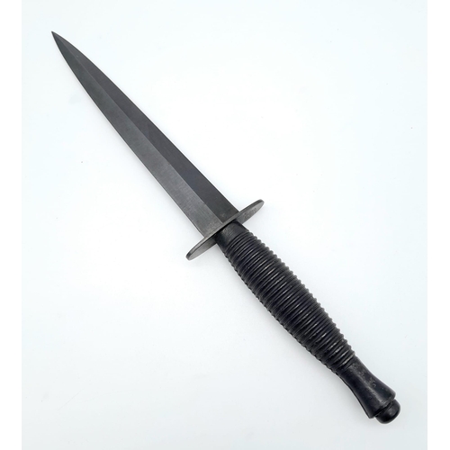 374 - A Fairbairn Sykes Design Commando Dagger by Wright and Son, Sheffield. 29cm Length in Leather Sheath... 