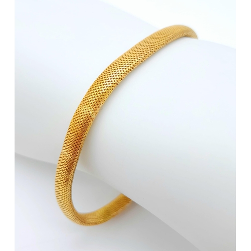 64 - A 9 K yellow gold snake skin bracelet, length: 19 cm, weight: 11.1 g