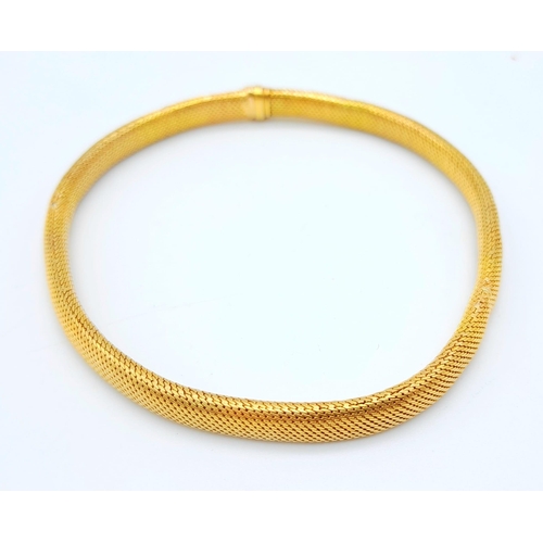 64 - A 9 K yellow gold snake skin bracelet, length: 19 cm, weight: 11.1 g