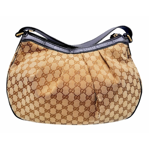 720 - A Gucci Brown Monogram Suki Shoulder Bag. Pleated canvas exterior with leather trim and strap, gold ... 