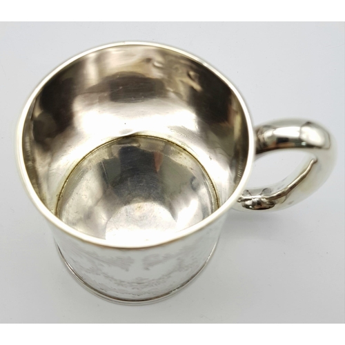 101 - AN ANTIQUE SILVER TANKARD INSCRIBED 