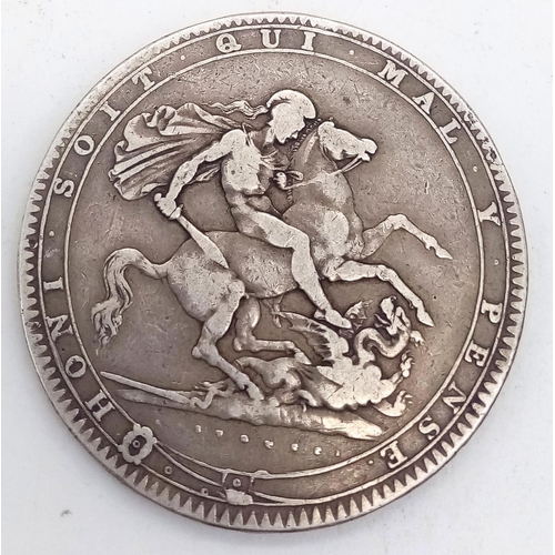 143 - A GEORGE III SILVER CROWN 1820 WITH GEORGE SLAYING THE DRAGON ON THE REVERSE SIDE .