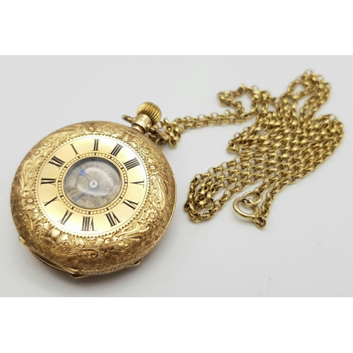 156 - A beautiful 14 K yellow gold half hunter/pendant watch, heavily engraved  on a long (64 cm) 9 k yell... 