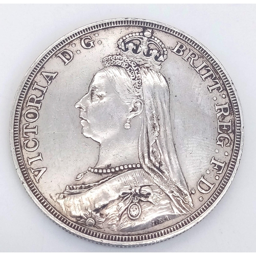 262 - A QUEEN VICTORIA SILVER CROWN DATED 1887 IN GOOD CONDITION .