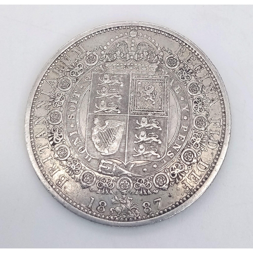 269 - A SHIELD BACK 1887 VICTORIAN HALF CROWN IN LOVELY CONDITION .