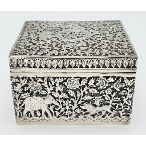 30 - A SOLID SILVER HINGED TRINKET BOX HAND ENGRAVED WITH AN AFRICAN THEME, IN VERY GOOD CONDITION AND AL... 