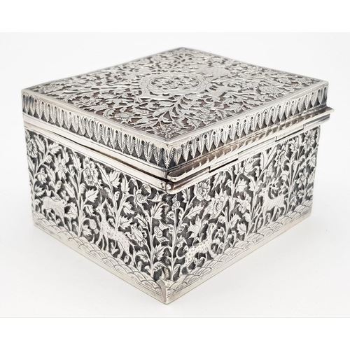 30 - A SOLID SILVER HINGED TRINKET BOX HAND ENGRAVED WITH AN AFRICAN THEME, IN VERY GOOD CONDITION AND AL... 