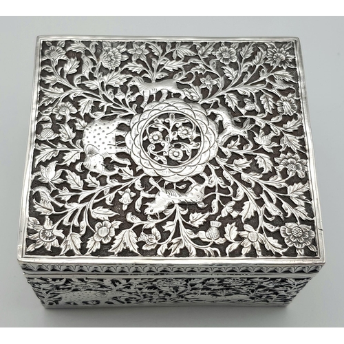 30 - A SOLID SILVER HINGED TRINKET BOX HAND ENGRAVED WITH AN AFRICAN THEME, IN VERY GOOD CONDITION AND AL... 