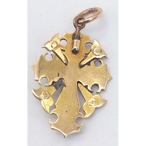 359 - A 9 k yellow gold fancy pendant cross with enamel and seed pearls, dimensions: 33 x 18 mm, weight: 3... 