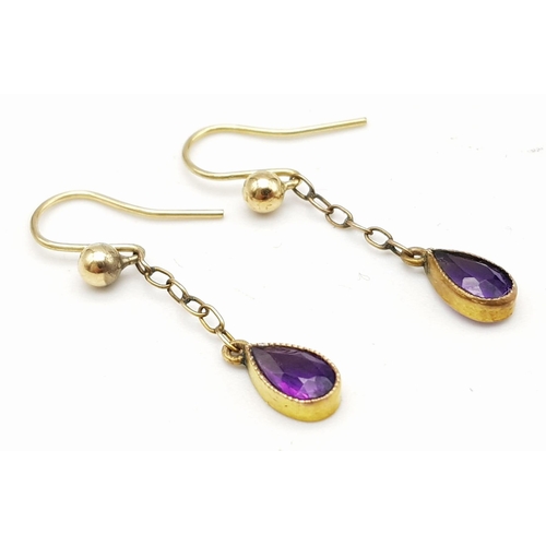 41 - An ART NOUVEAU 9 K yellow gold pendant with vivid coloured amethysts and natural seed pearls, accomp... 