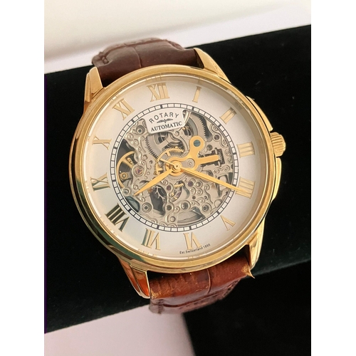 441 - Gentlemans ROTARY AUTOMATIC SKELETON WRISTWATCH. Finished in gold tone with skeleton front and back.... 