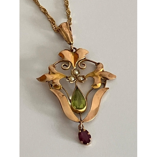 455 - Antique 9 carat GOLD PENDANT set with PERIDOT,GARNET, and SEED PEARL detail, mounted on a 9 carat GO... 