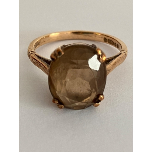 476 - 9 carat GOLD RING Having large (2.0 carat) oval cut YELLOW AMETHYST Mounted to top. Full UK hallmark... 