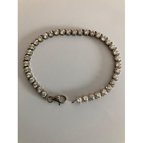 518 - Beautiful SILVER TENNIS BRACELET set with 37 x  Round Cut Sparkling Zirconia  Gemstones. 19 cm.