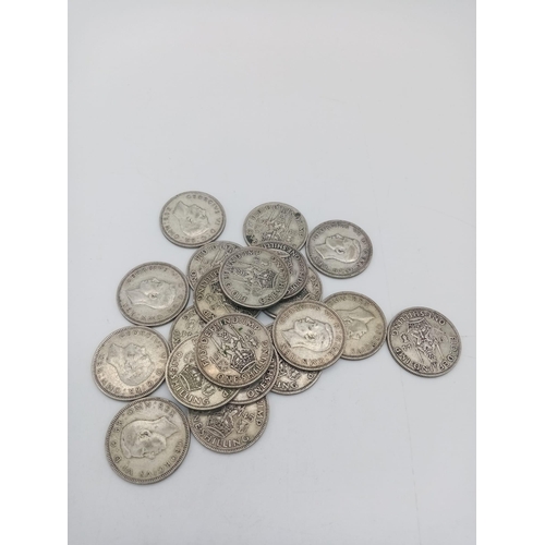 957 - A Parcel of 20 Pre-1947 Silber Shilling Coins. 112.34 Grams.