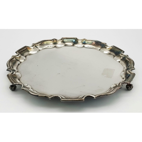 276 - A SOLID SILVER PLATTER HALLMARKED 1924 BIRMINGHAM .  520gms