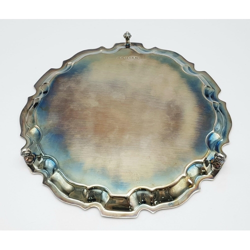 276 - A SOLID SILVER PLATTER HALLMARKED 1924 BIRMINGHAM .  520gms