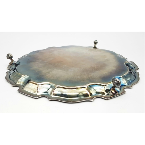 276 - A SOLID SILVER PLATTER HALLMARKED 1924 BIRMINGHAM .  520gms