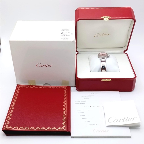 32 - A Pasha De Cartier Quartz Ladies Watch. Stainless steel bracelet and case - 28mm. Metallic pink dial... 