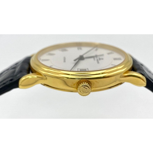 39 - A Baume and Mercier 18K Gold Cased Automatic Gents Watch. Model - MV045075. Black leather strap. 18k... 